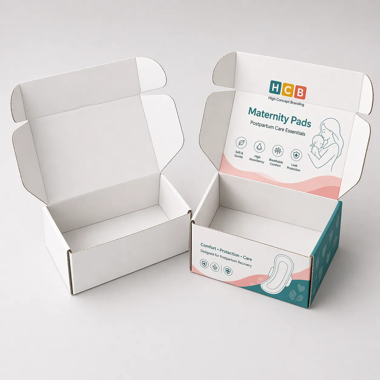 Two square cardboard boxes, one plain and one printed with pink floral feminine care designs. class=